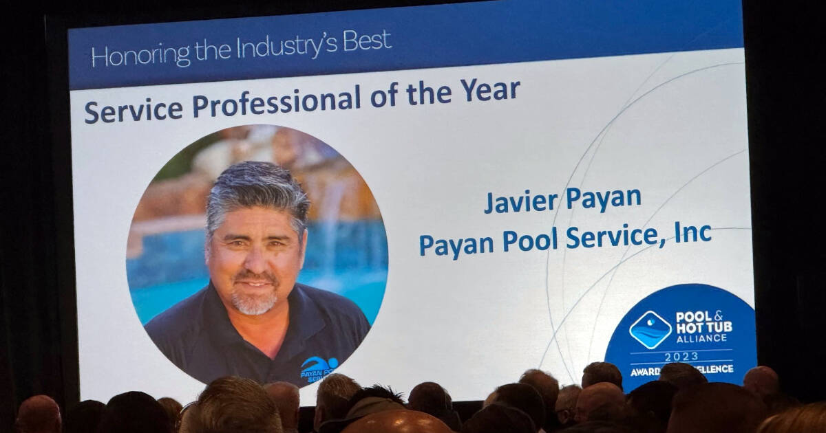 Service Professional of the Year for 2023 Audience view of the presentation screen announcing the Service Professional of the Year for 2023 by the Pool and Hot Tub Association (PHTA) - Javier Payan.